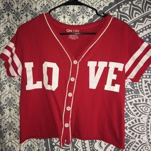 Crooked jersey with buttons